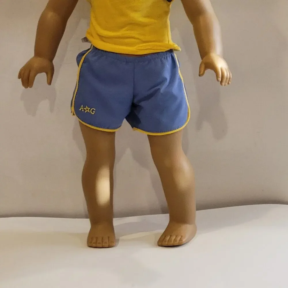 American Girl Doll Grey eyes light brown  hair.